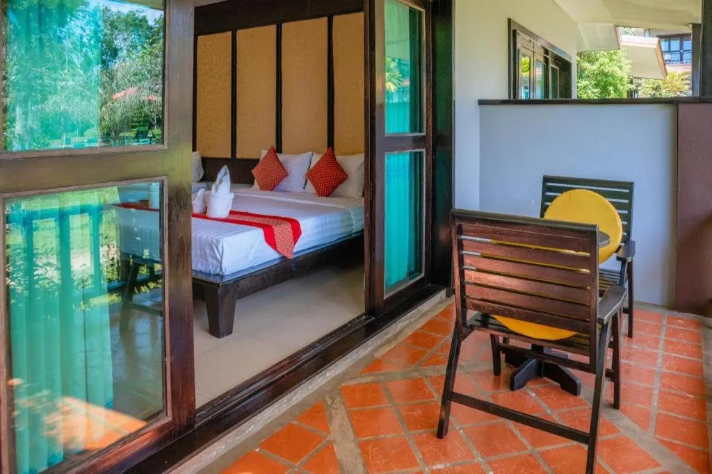 Bed in Poochommhok Resort