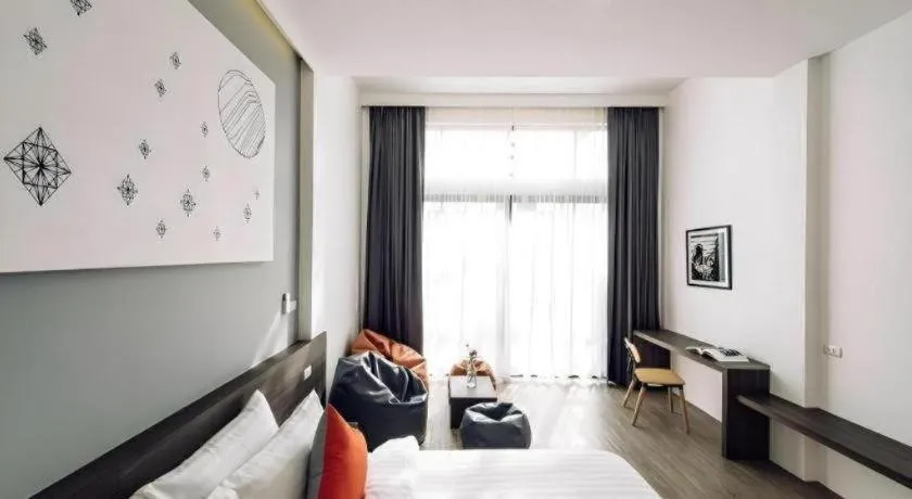 Bed in PIMDARA HOTEL