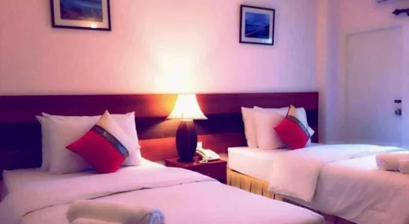 Bed in Sirimathani Hotel