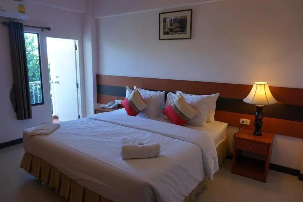 Bed in Sirimathani Hotel