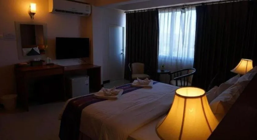 Bed in Sirimathani Hotel