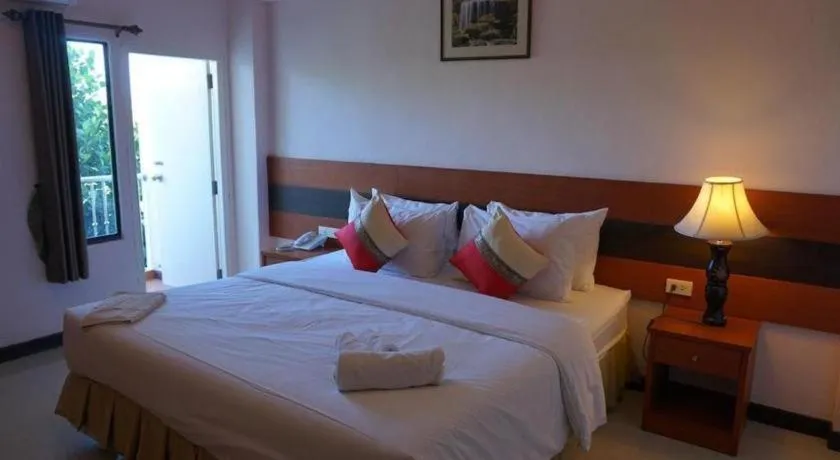 Bed in Sirimathani Hotel