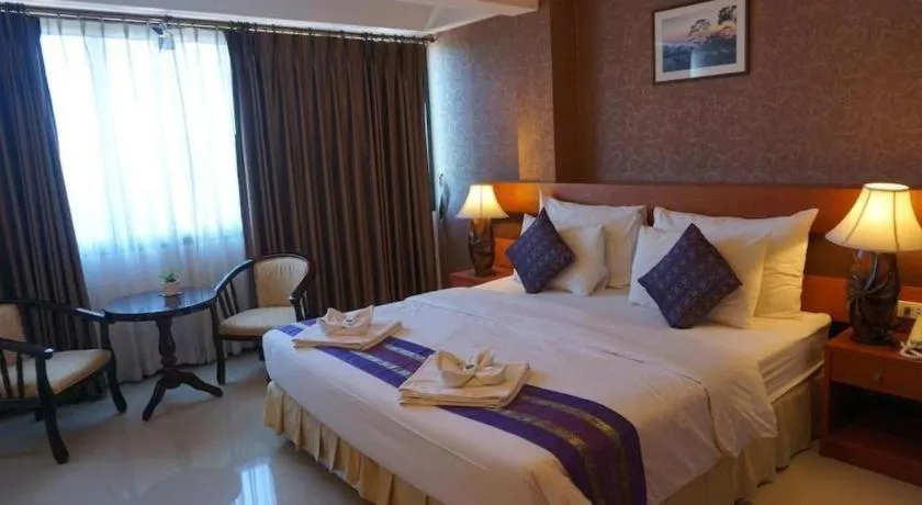 Bed in Sirimathani Hotel