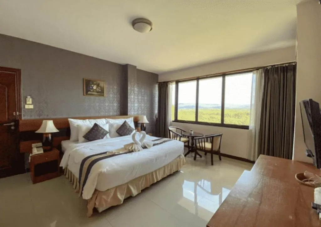 Bed in Sirimathani Hotel