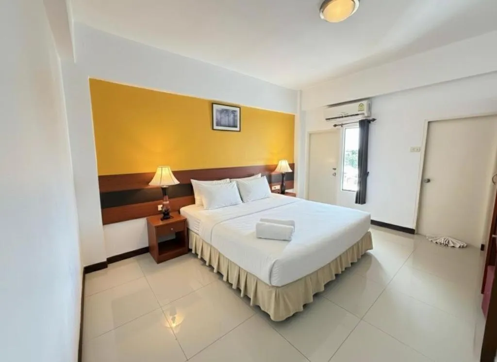 Bed in Sirimathani Hotel