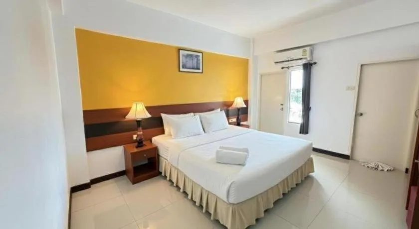 Bed in Sirimathani Hotel