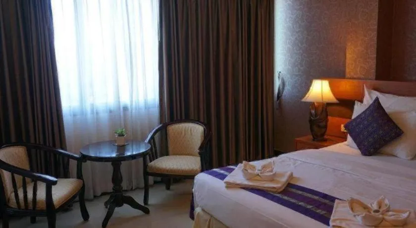 Bed in Sirimathani Hotel