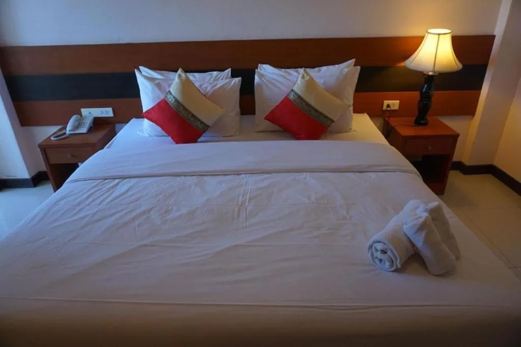 Bed in Sirimathani Hotel