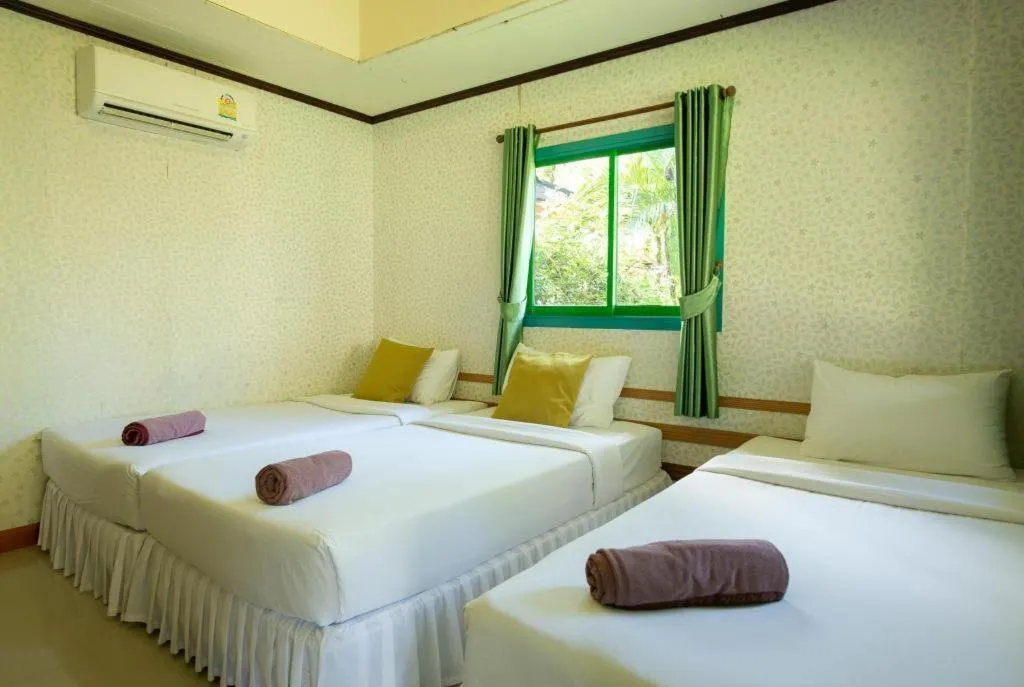 Bed in Ko Kut Ao Phrao Beach Resort