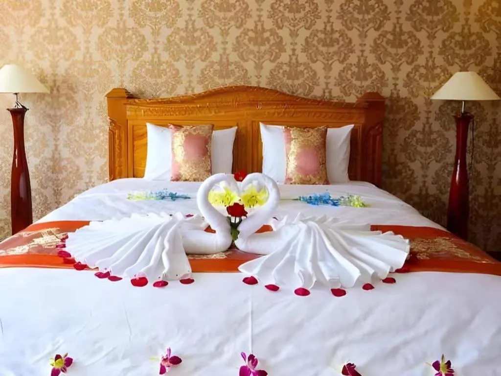 Bed in New Palace Bac Lieu Hotel