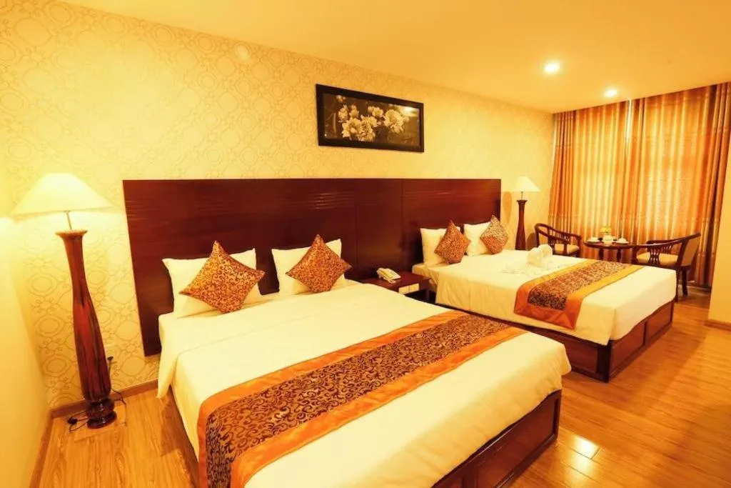 Bed in New Palace Bac Lieu Hotel