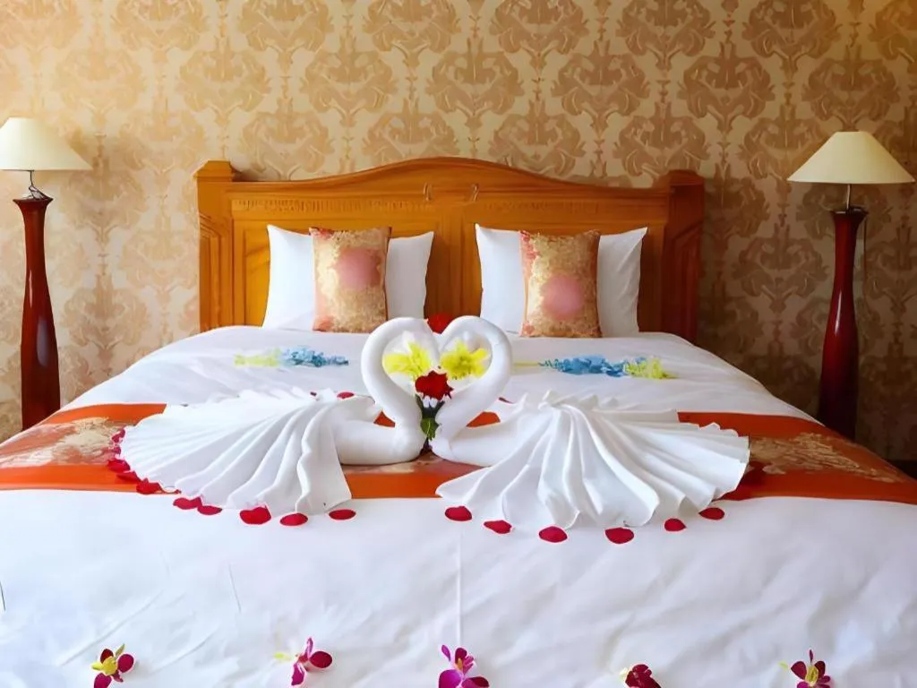 Bed in New Palace Bac Lieu Hotel