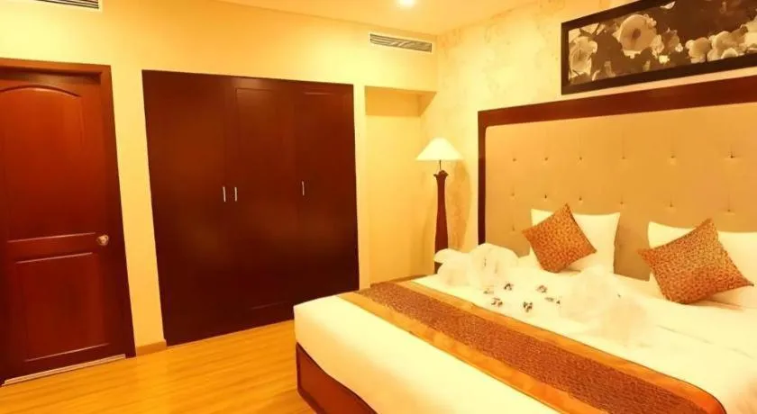 Bed in New Palace Bac Lieu Hotel