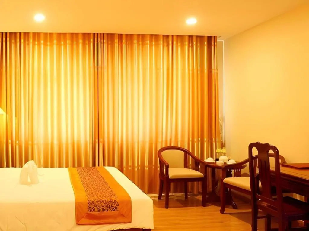 Bed in New Palace Bac Lieu Hotel