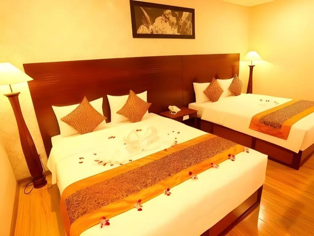 Bed in New Palace Bac Lieu Hotel