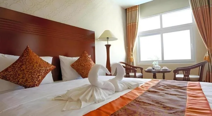 Bed in New Palace Bac Lieu Hotel