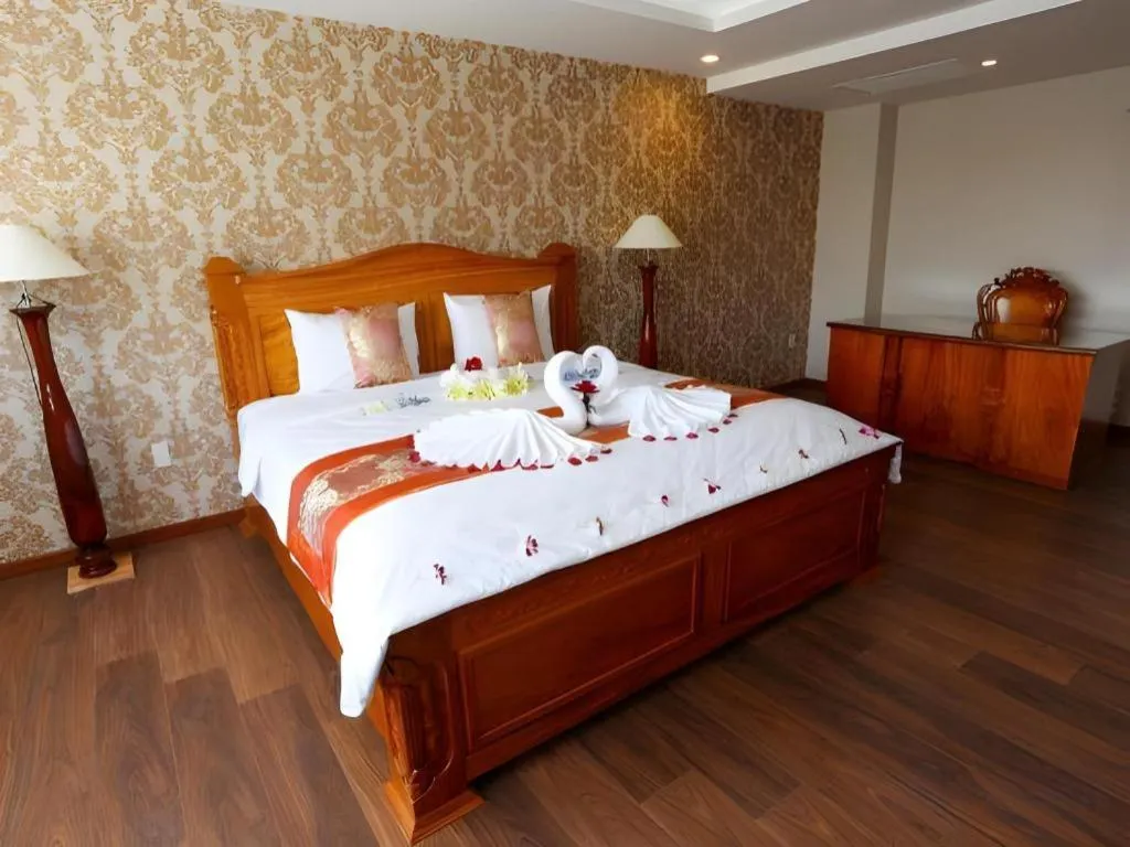 Bed in New Palace Bac Lieu Hotel