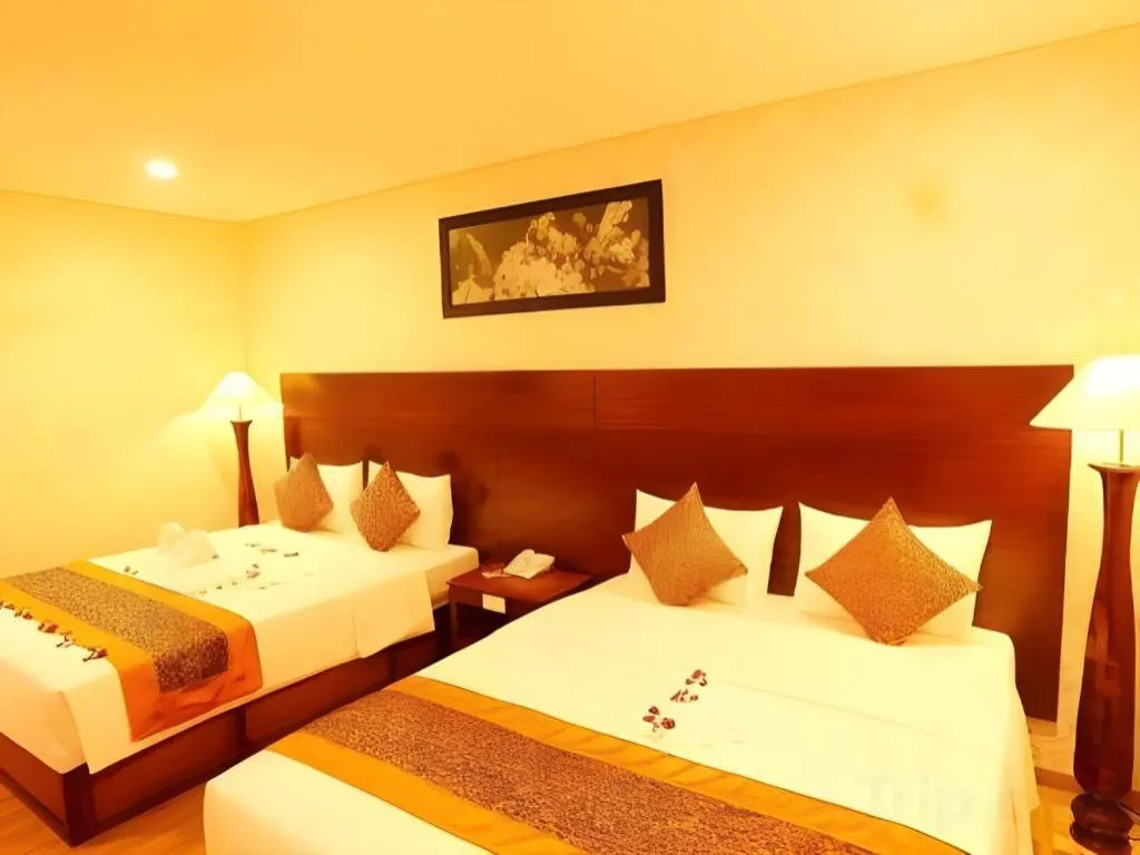 Bed in New Palace Bac Lieu Hotel