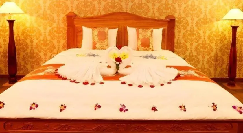 Bed in New Palace Bac Lieu Hotel