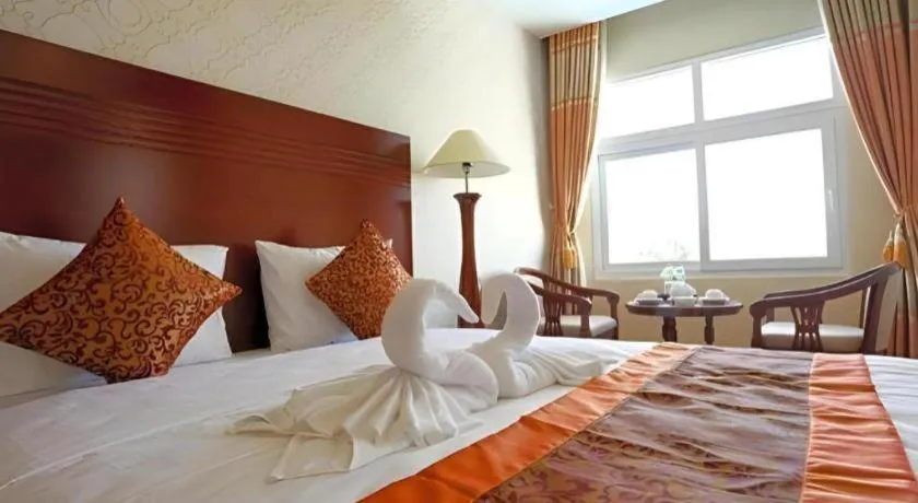 Bed in New Palace Bac Lieu Hotel