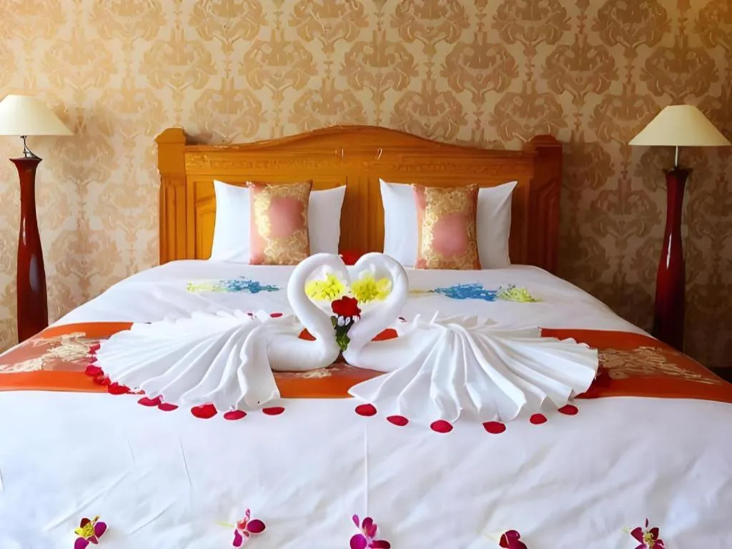 Bed in New Palace Bac Lieu Hotel