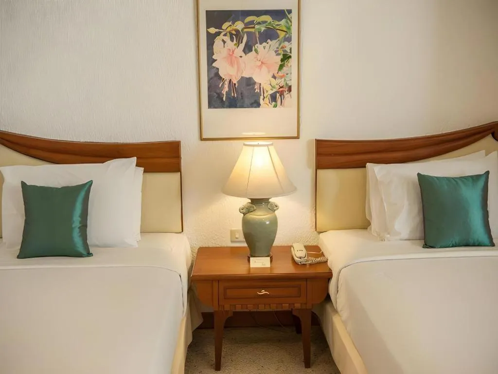 Bed in Lido Beach Hotel