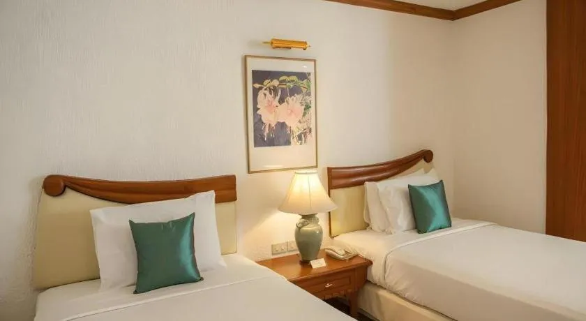 Bed in Lido Beach Hotel