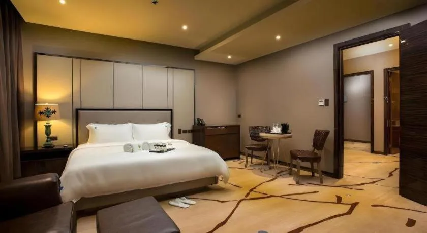 Bed in Lotus Blu Hotel