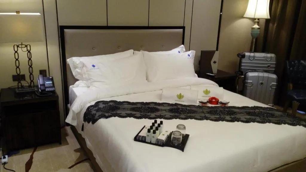 Bed in Lotus Blu Hotel