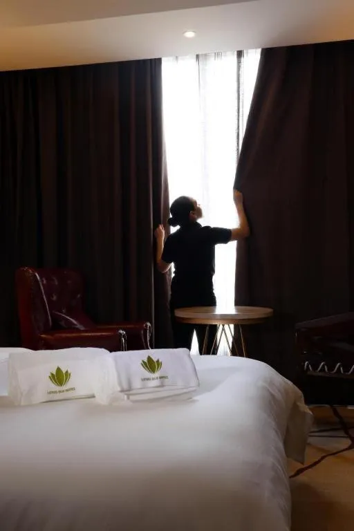 Bed in Lotus Blu Hotel