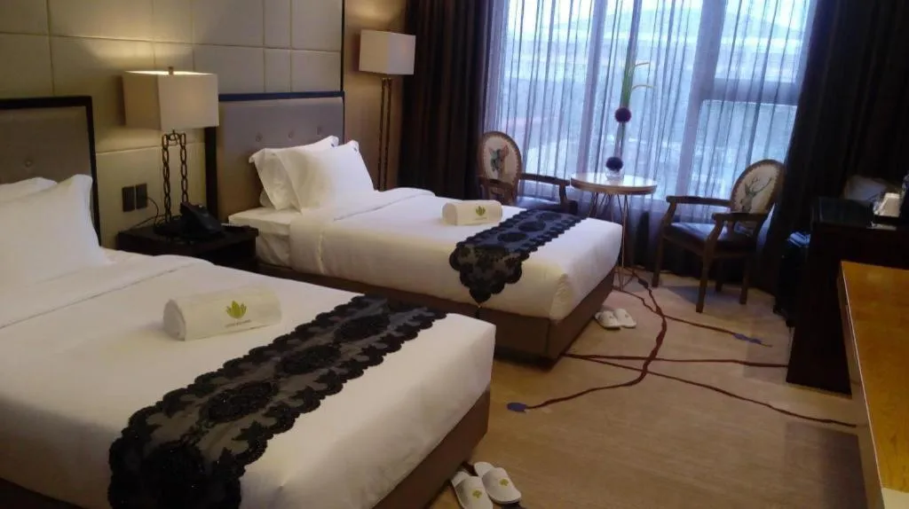 Bed in Lotus Blu Hotel