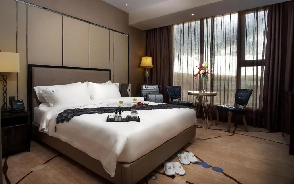 Bed in Lotus Blu Hotel