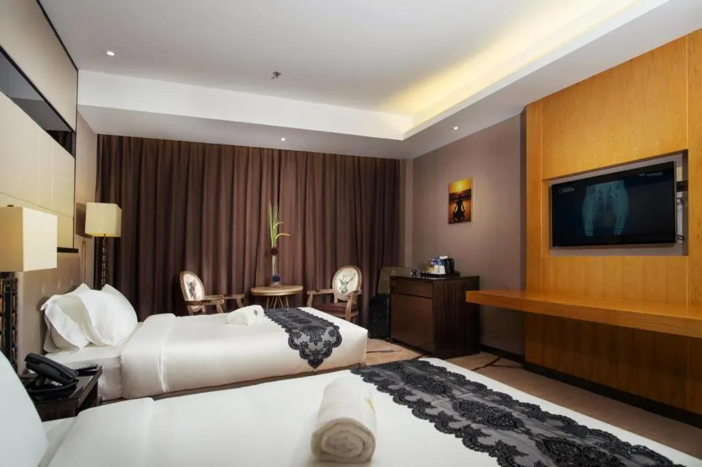 Bed in Lotus Blu Hotel