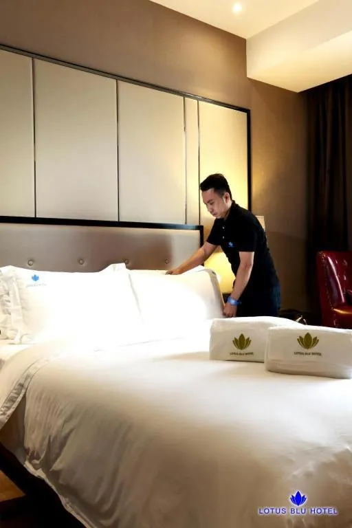 Bed in Lotus Blu Hotel
