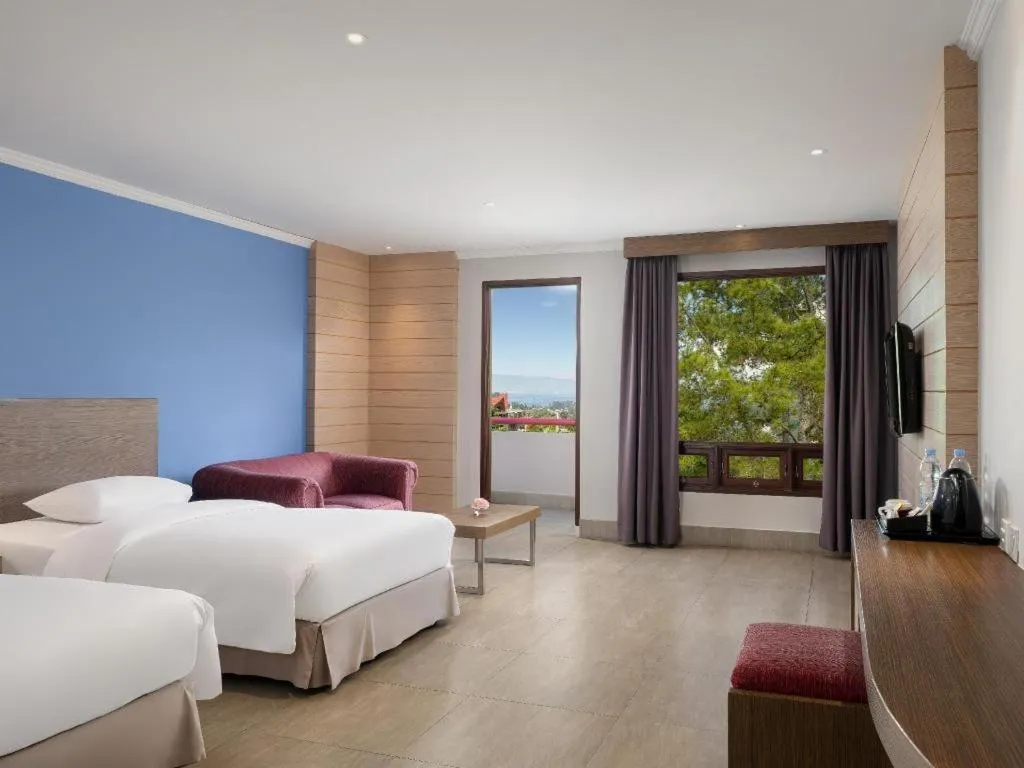 Bed in Hotel Niagara Parapat