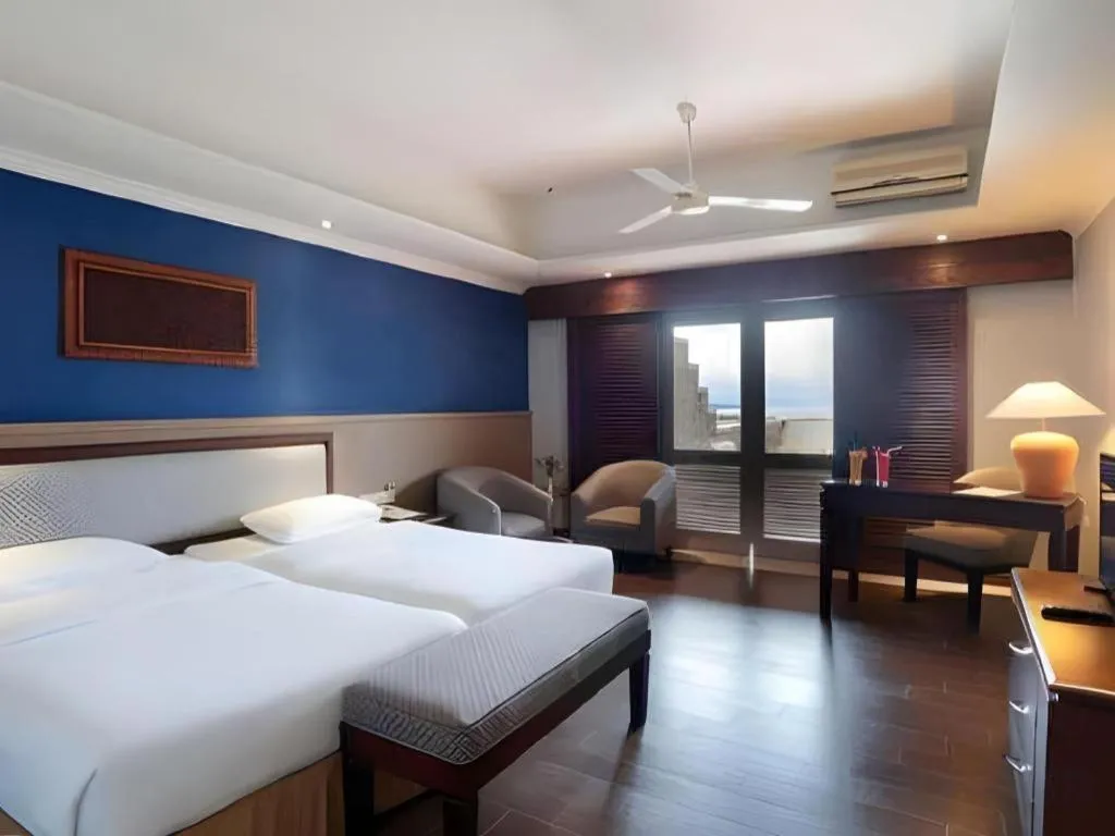 Bed in Hotel Niagara Parapat