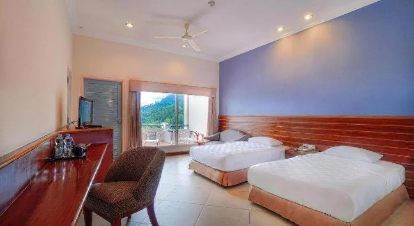 Bed in Hotel Niagara Parapat