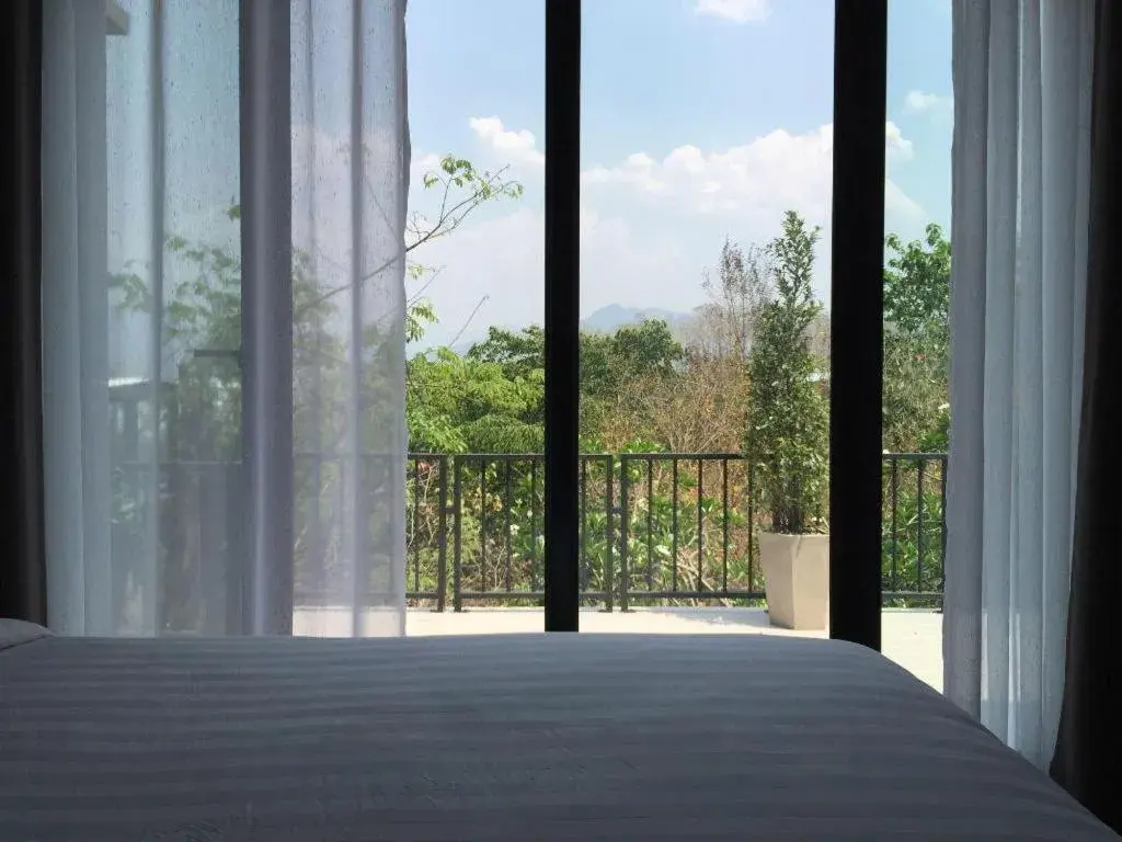 Bed in Cocoa Valley Resort Bed in Cocoa Valley Resort