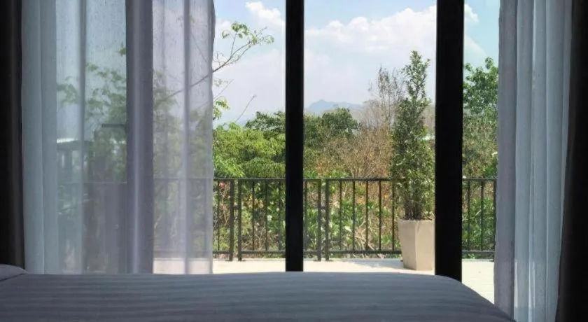 Bed in Cocoa Valley Resort