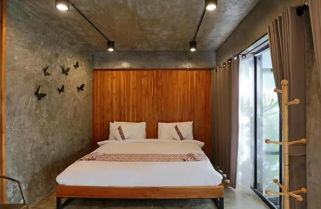 Bed in Cocoa Valley Resort