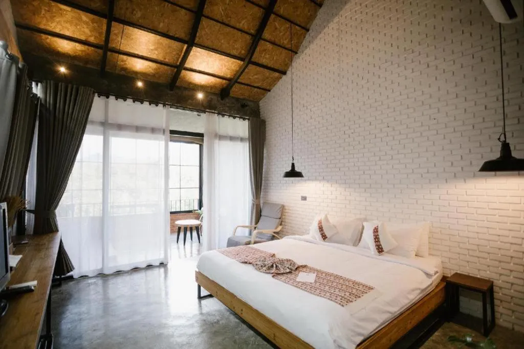 Bed in Cocoa Valley Resort