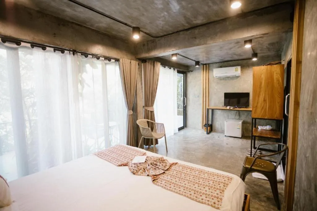 Bed in Cocoa Valley Resort