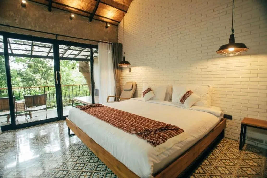 Bed in Cocoa Valley Resort