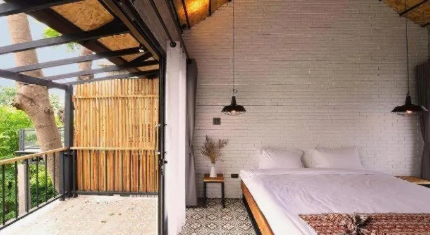 Bed in Cocoa Valley Resort