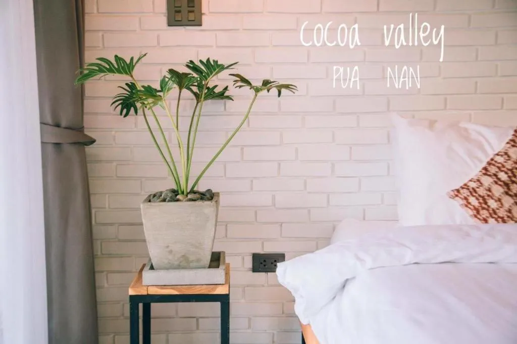 Bed in Cocoa Valley Resort