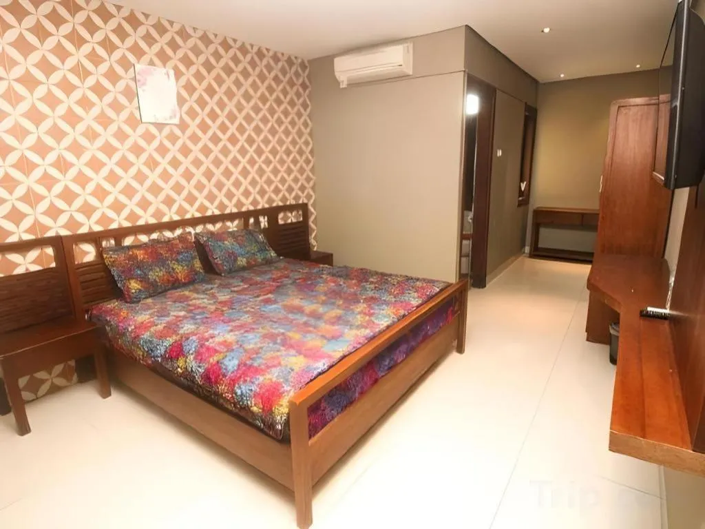 Bed in Hotel Adilla Syariah Ambarukmo