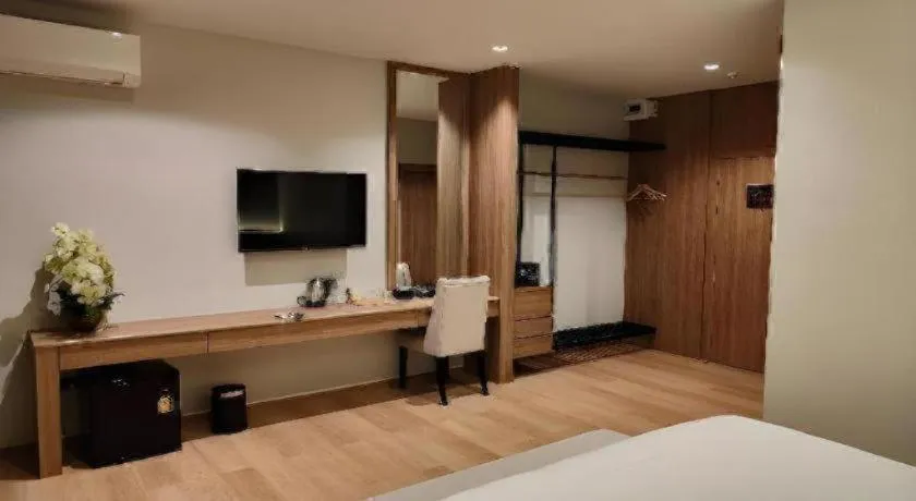 Bed in Butterfly Princess Hotel