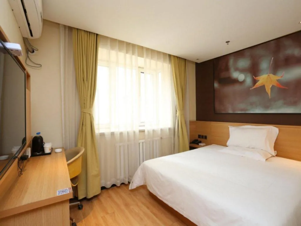 Bed in IU Hotel Tianjin Xiqing Zhong Bei Zhen Branch