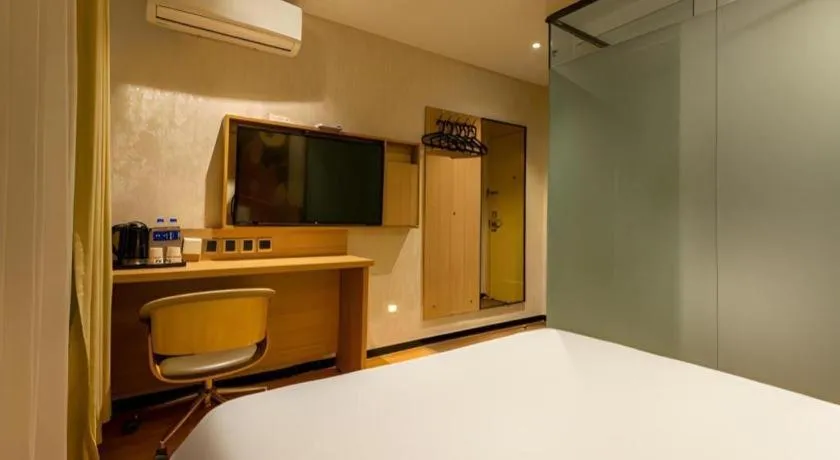 Bed in IU Hotel Tianjin Xiqing Zhong Bei Zhen Branch