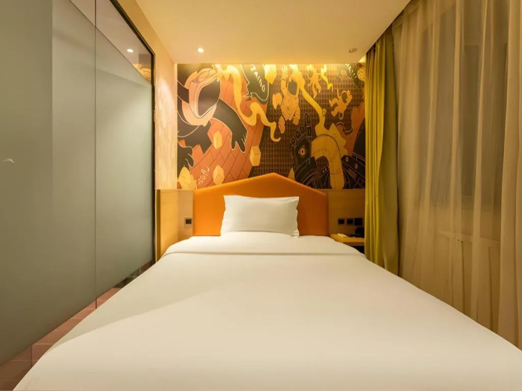 Bed in IU Hotel Tianjin Xiqing Zhong Bei Zhen Branch